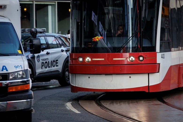 A streetcar approaches a stop at Yonge and Dundas on Jan. 26, 2023. Police will increase their presence on public transit after a surge of violent incidents on the TTC.