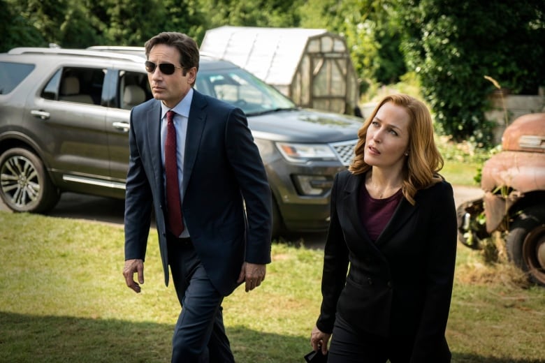 This photo provided by FOX shows, David Duchovny, left, as Fox Mulder and Gillian Anderson as Dana Scully in an episode of "The X-Files." Fox said Thursday it has ordered a second chapter of what it‚Äôs calling an ‚ÄúX-Files‚Äù ‚Äúevent series.‚Äù The 10-episode series will air during the upcoming 2017-18 TV season. (Ed Araquel/FOX via AP)