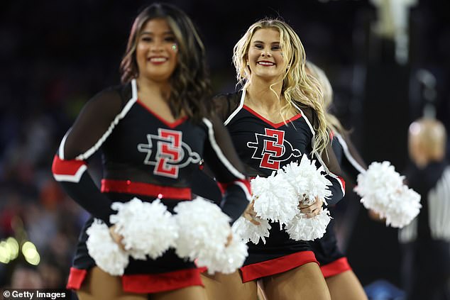 Aztecs cheerleaders root for San Diego State in the first half of the Final Four matchup