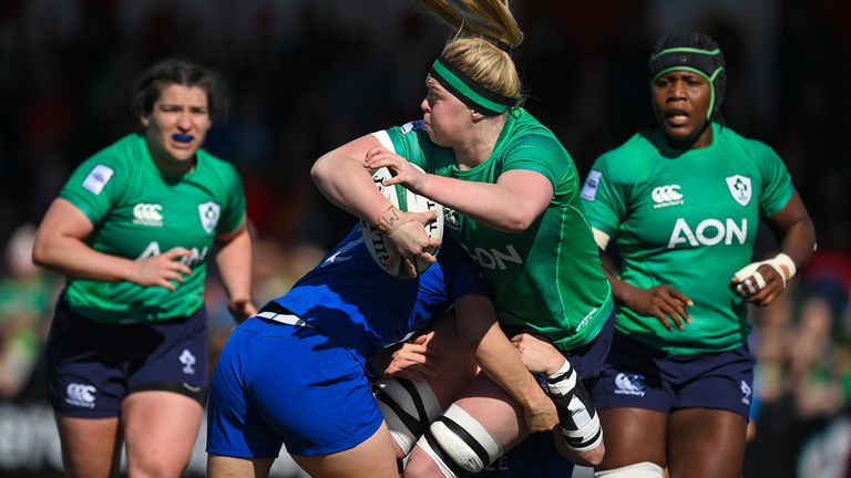 Sam Monaghan of Ireland is tackled by France's Agathe Sochat