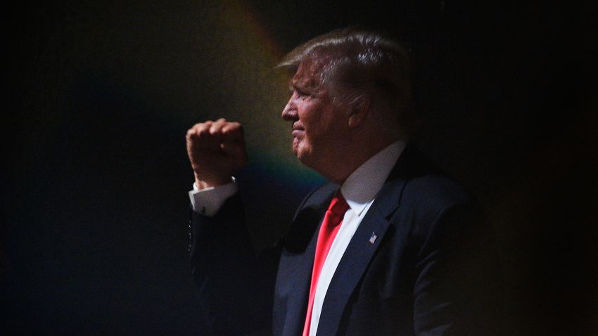 Presumptive Republican presidential nominee Donald Trump motions to the crowd while leaving the stage after a campaign event at the Duke Energy Center for the Performing Arts on July 5, 2016 in Raleigh, North Carolina.