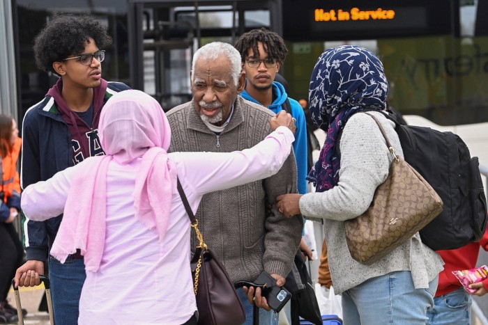 British nationals arrive back at Stansted airport, England