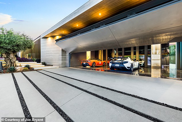 There's room for a fleet of sportcars in the enormous garage space