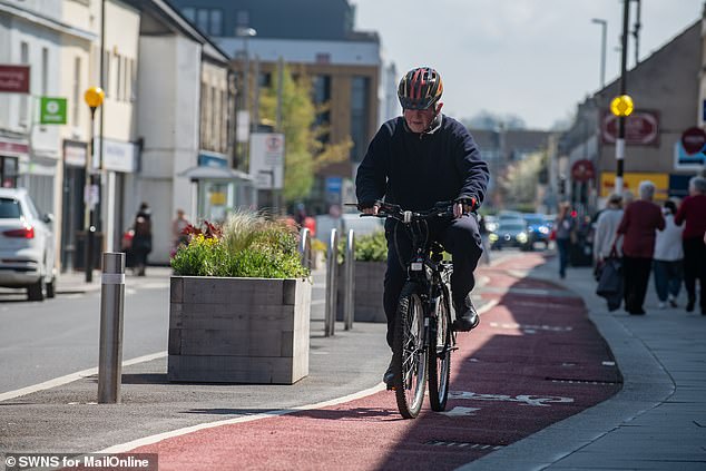 One of those using the cycle lane today was Mike Wright, 84, who said: 'I use this cycle lane whenever I come into town but it's never busy'