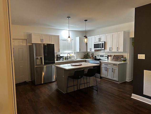 The Johnsons spent over a year tearing the property apart and renovating it. Pictured: the kitchen now