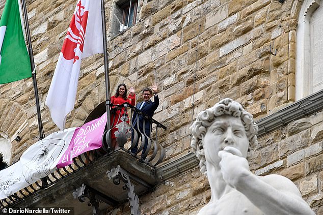 Carrasquilla (pictured with the mayor of Florence) stepped down as principal of Tallahassee Classical school in the Florida city last month after one parent claimed the towering sculpture was pornographic. Other parents complained they weren't notified in advance that their children would be shown the nude figure during a lesson featuring the Renaissance