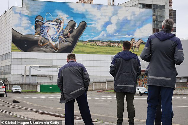 Employees of the Chernobyl Nuclear Power Plant plant during the 37th anniversary of honoring the memory of the Chernobyl disaster victims on April 26, 2023