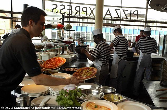 Each Pizza Express shop is individually designed depending on the local tastes of the area. Pictured: The Pizza Express in Kingston upon Thames in 2004