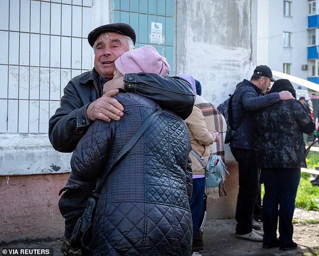 In a haunting scene, survivors, stricken with grief, broke down in tears and grasped at each other for some form of comfort as they watched their neighbours being carried away from the rubble in body bags