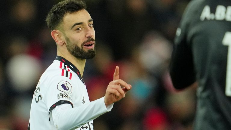 Manchester United&#39;s Bruno Fernandes gestures towards Liverpool&#39;s goalkeeper Alisson during the English Premier League soccer match between Liverpool and Manchester United at Anfield in Liverpool, England, Sunday, March 5, 2023. (AP Photo/Jon Super)