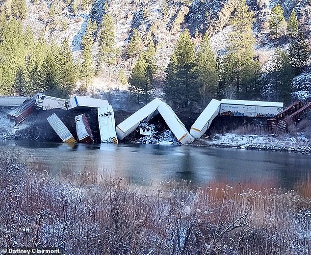 Montana officials cleaning up after 25-car freight train derails in Sanders County