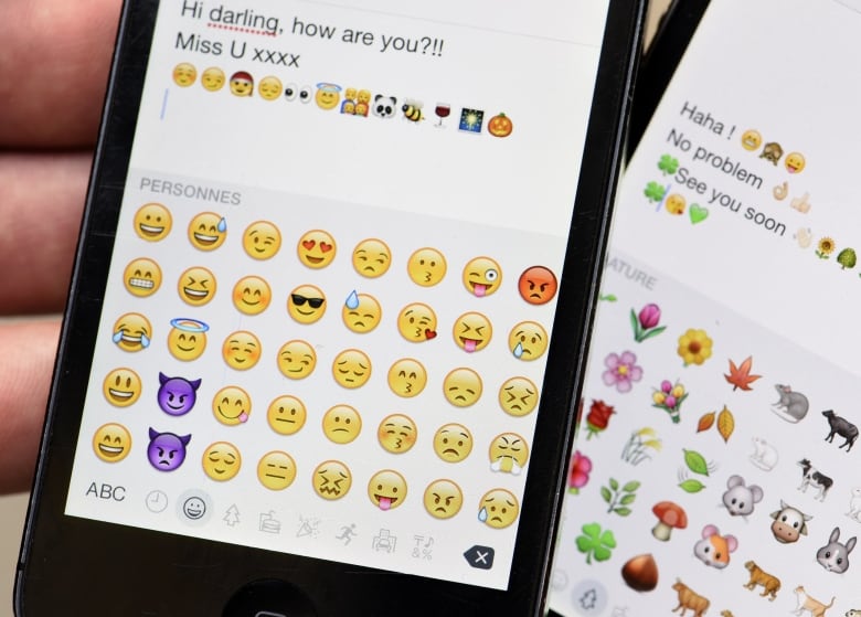 Emojis displayed on smart phone screens.