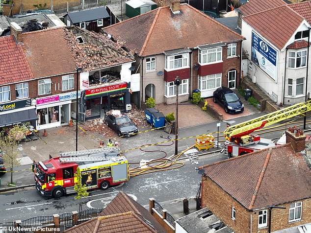 Woman and two men are rushed to hospital after ‘gas blast’ blows out windows of London takeaway