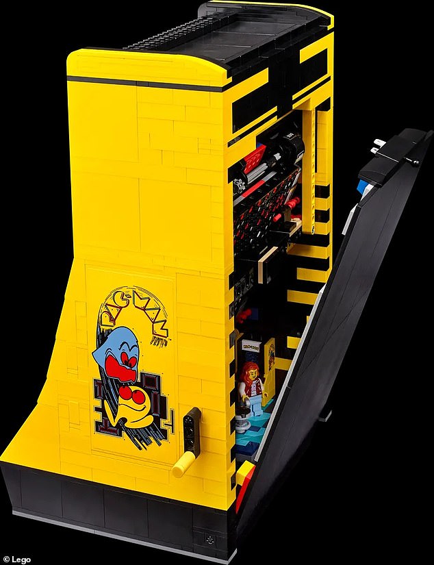 The miniature Lego arcade game measuring 13 x 10 x 7 inches and even has a removable back panel that allows owners to look inside and see the inner workings of the machine