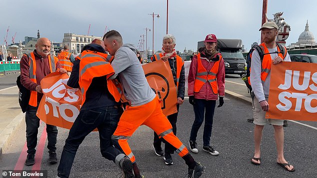 Just Stop Oil said 'tensions have been high' as one man tried to throw a supporter on to the ground and was later arrested