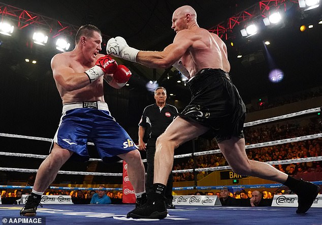 Barry is seen fighting Paul Gallen in Melbourne in 2019