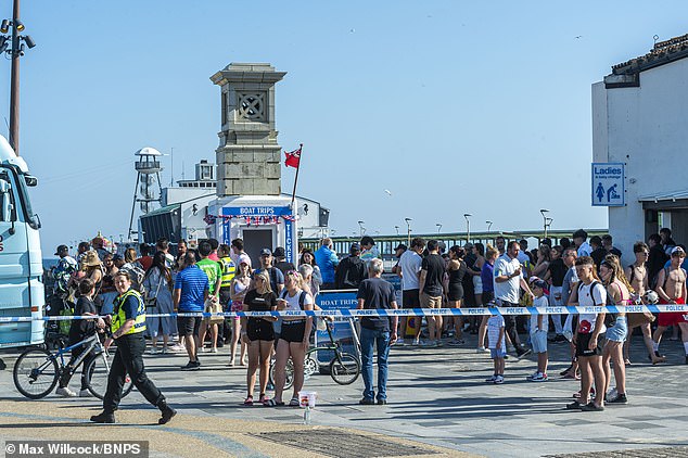 Thousands of people were enjoying the weather before being asked to clear the beach by police