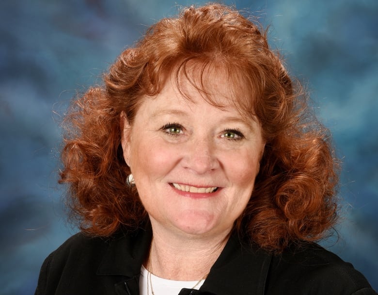 Portrait of a woman with red hair. 