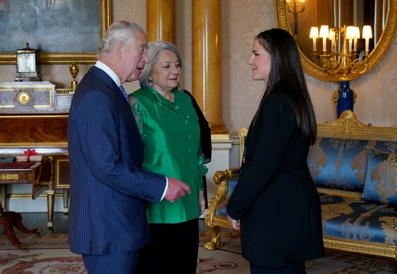 An Indigenous lead with the Métis National Council speaks with King Charles at Buckingham Palace.