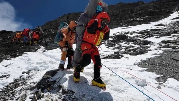 Sherpa carries Malyasian climber to safety in ‘very rare’ high-altitude Everest rescue