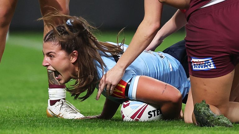 Jess Sergis celebrates her try for New South Wales