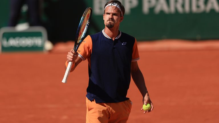 Germany&#39;s Daniel Altmaier reacts after winning a point against Italy&#39;s Jannik Sinner during their second round match of the French Open tennis tournament at the Roland Garros stadium in Paris, Thursday, June 1, 2023. (AP Photo/Aurelien Morissard)