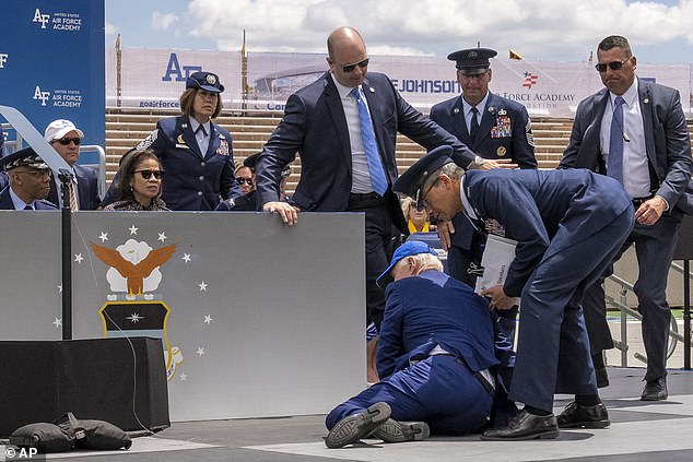 'He's fine,' White House Communications Director Ben LaBolt tweeted afterward. 'There was a sandbag (seen left) on stage while he was shaking hands.'