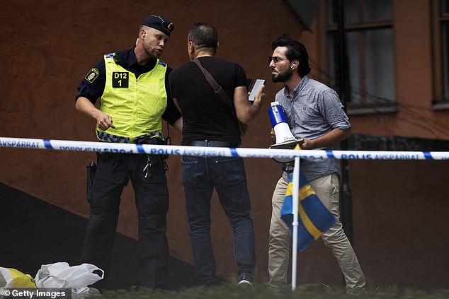 Police had granted Momika (right) a permit for the protest in line with free-speech protections after an appeals court rejected their ban on Koran burning protests, but said later the man had been charged with agitation against an ethnic or national group