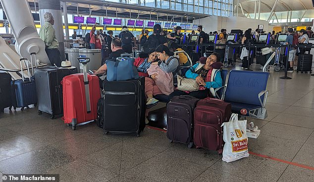 NEW YORK: Airline passengers wait at JFK's Terminal 4 to check in for their flights on Air India after flight delays on Thursday