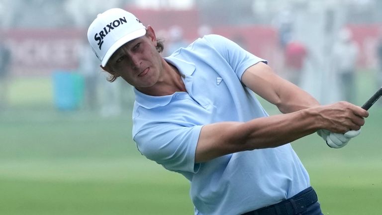 Peter Kuest hits his approach shot onto the 18th green during the first round of the 2023 Rocket Mortgage Classic