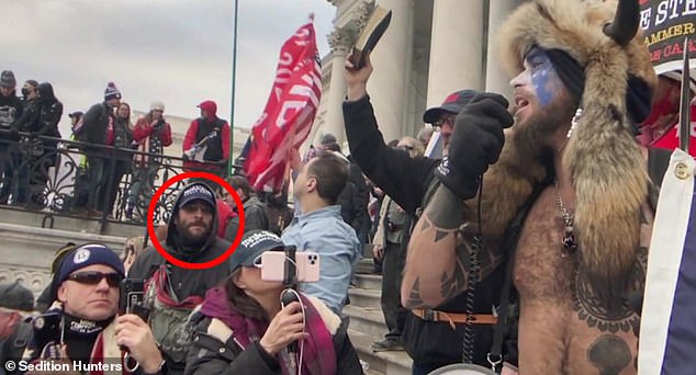 37-year-old Taylor Taranto, of Seattle, Washington was arrested running towards former President Barack Obama's Washington, DC home. He is seen during the Capitol siege