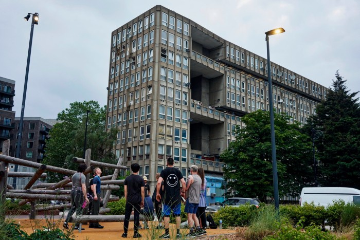 People outside Robin Hood Gardens in Poplar, London