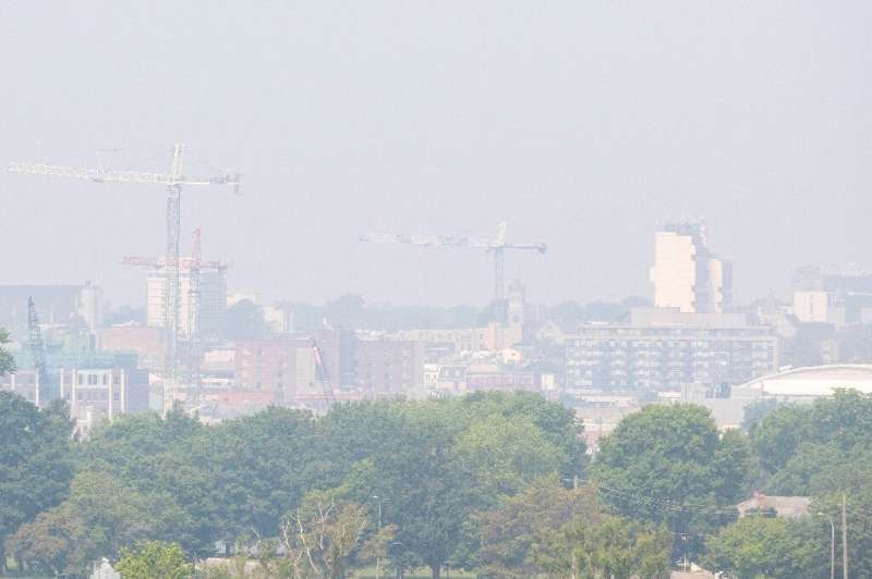 A blanket of smoke from wildfires in north Ontario and Quebec covers the skyline in Kingston, Ontario, Canada, on June 29, 2023