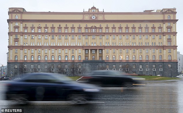 Cars drive past the headquarters of the Federal Security Service (FSB) in central Moscow, Russia