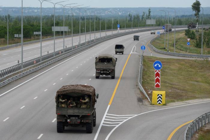 A Wagner convoy heads north towards Moscow