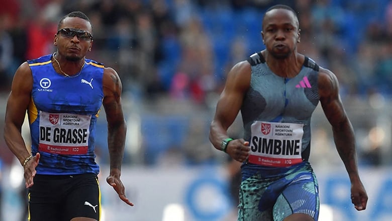 Two men's sprinters near finish line in 100-metre sprint at Ostrava Golden Spike meet in the Czech Republic.