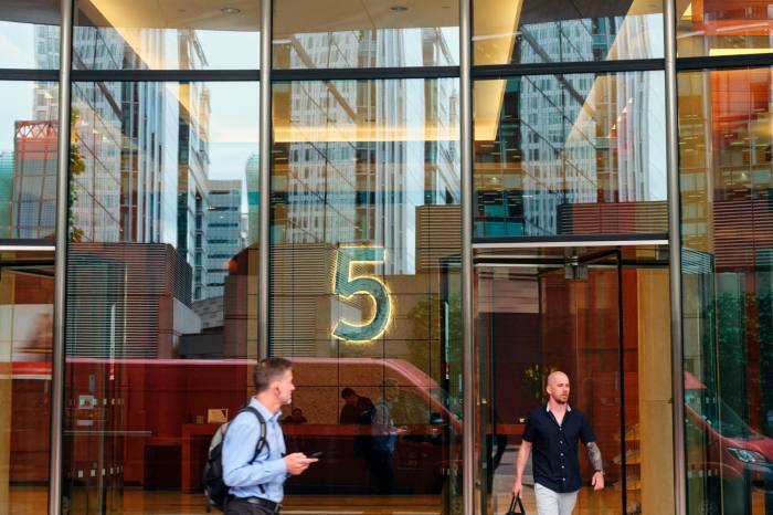 People outside 5 Churchill Place in Canary Wharf