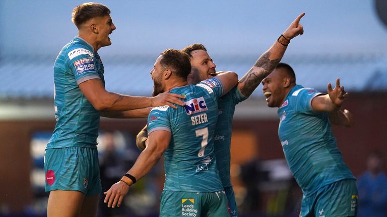 Richie Myler is congratulated after scoring a try against his former side