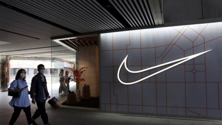 Nike tops revenue expectations but markdowns and costs hit profits