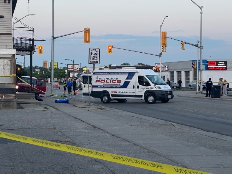 A heavy police presence was at the intersection of Talbot Street and Caso Crossing in downtown St. Thomas after five pedestrians were struck by a red pickup truck. One of the fatalities involved a child. 