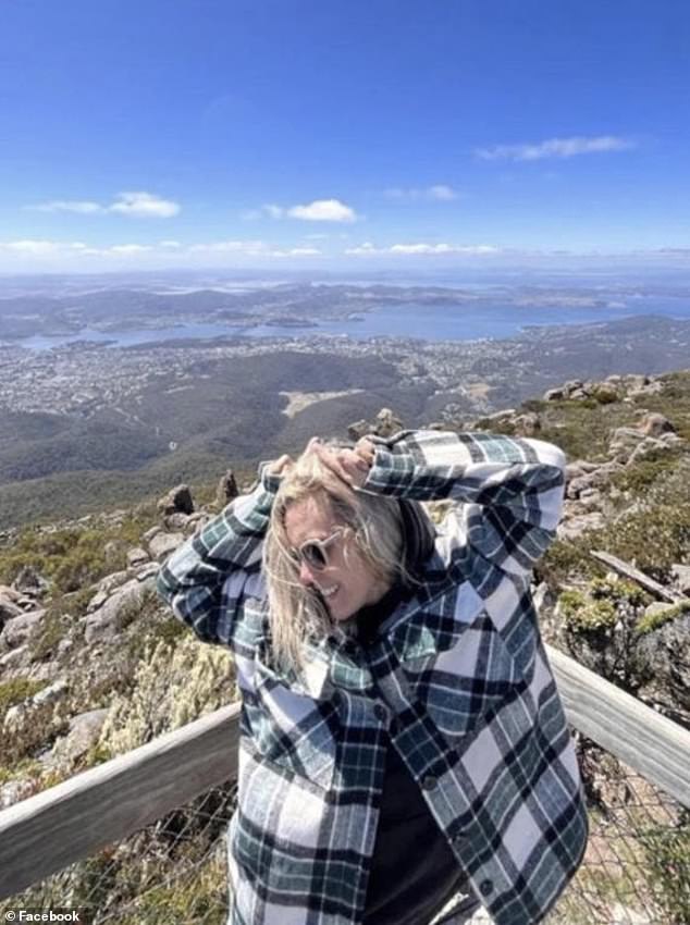 A photo, posted to Facebook on February 22, shows a playful and smiling Ms Cremer standing at wilderness lookout using her hands to make 'devil's horns' on her head