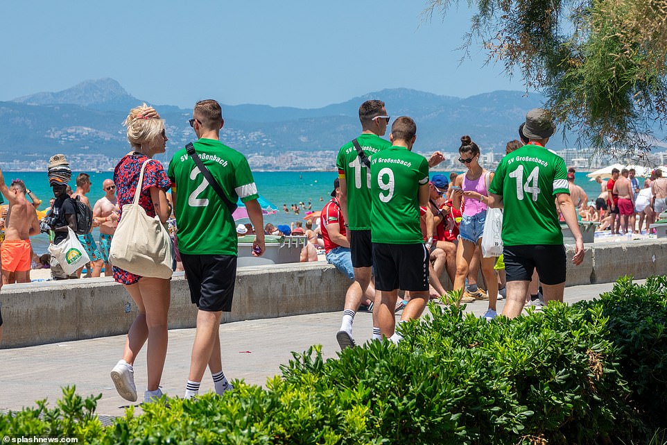 One group appeared to wear matching football kits for the amateur sports team SV Grossenbach