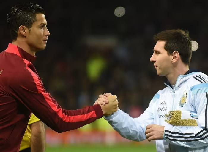 Cristiano Ronaldo and Lionel Messi shake hands