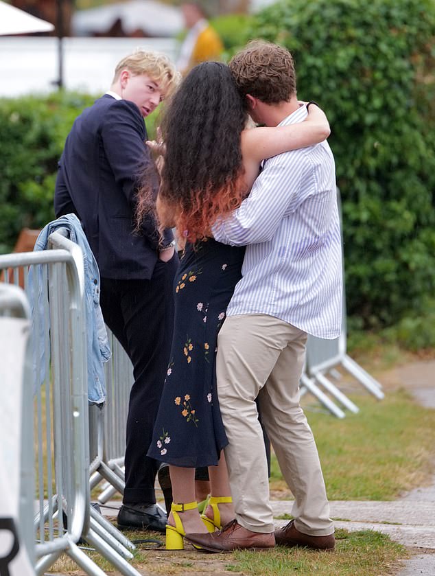 Pals pictured hugging as they partied on the third day of the rowing celebration