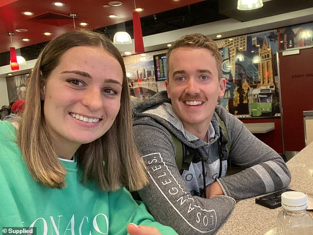 'It was just luck that I was diagnosed because we never really thought anything of my symptoms. I should've gone to the doctor sooner, but being so young I never thought it would be anything serious,' said Marnie (pictured with her fiancé Bailey before her diagnosis)