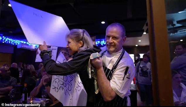 Celebrity chef John Mountain is seen dragging one vegan activist out of his restaurant on Friday night