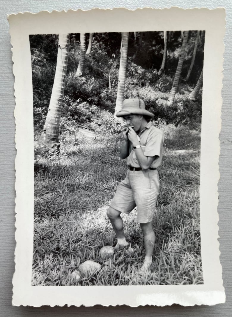 Fuelling up with fresh coconuts in the Philippines. Douglas Carr kept a journal and took many photographs on his trip around the world. 