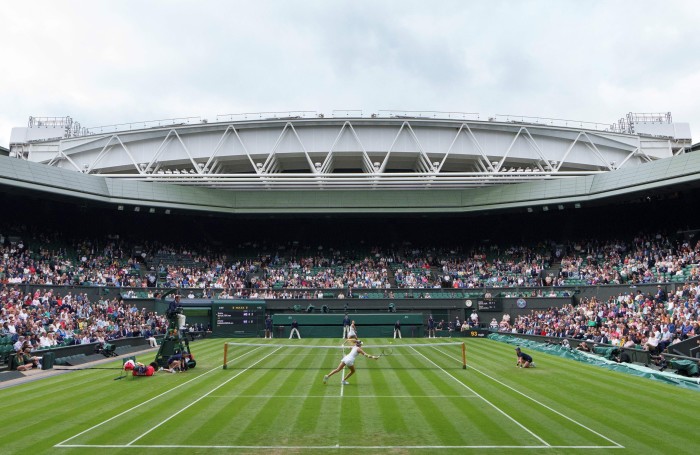 A widescreen shot of Aryna Sabalenka versus British player Katie Boulter at the 2021 Championships 