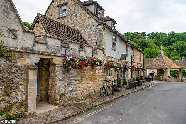 Locals say the number of people who live in the village full-time has fallen since lockdown, with houses that go up for sale being snapped up and used as second homes or Airbnbs. A property in Castle Combe is pictured above