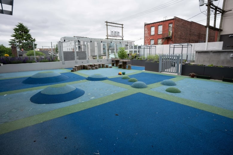 The playground on a rooftop at a women's centre.